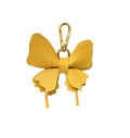 Women's Leather Bow Keychain, Stylish Multi-Color Bag Charm with Lobster Clasp, Cute Purse/Key Accessory - color: Yellow