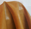 NAT Leathers 24 inch x 54 inch Vegan Faux Leather Fabric by the Yard Synthetic Pleather 0.9 mm Soft Smooth Upholstery 9 sq.ft. (24" x 54" -2/3 of Yard) (Caramel) - color: Caramel